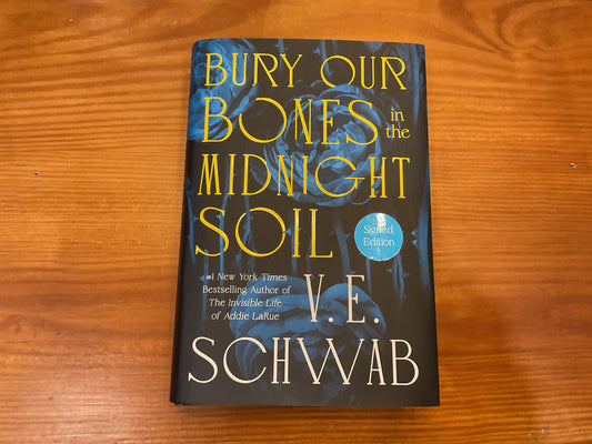 Bury our bones in the midnight soil by V.E Schwab